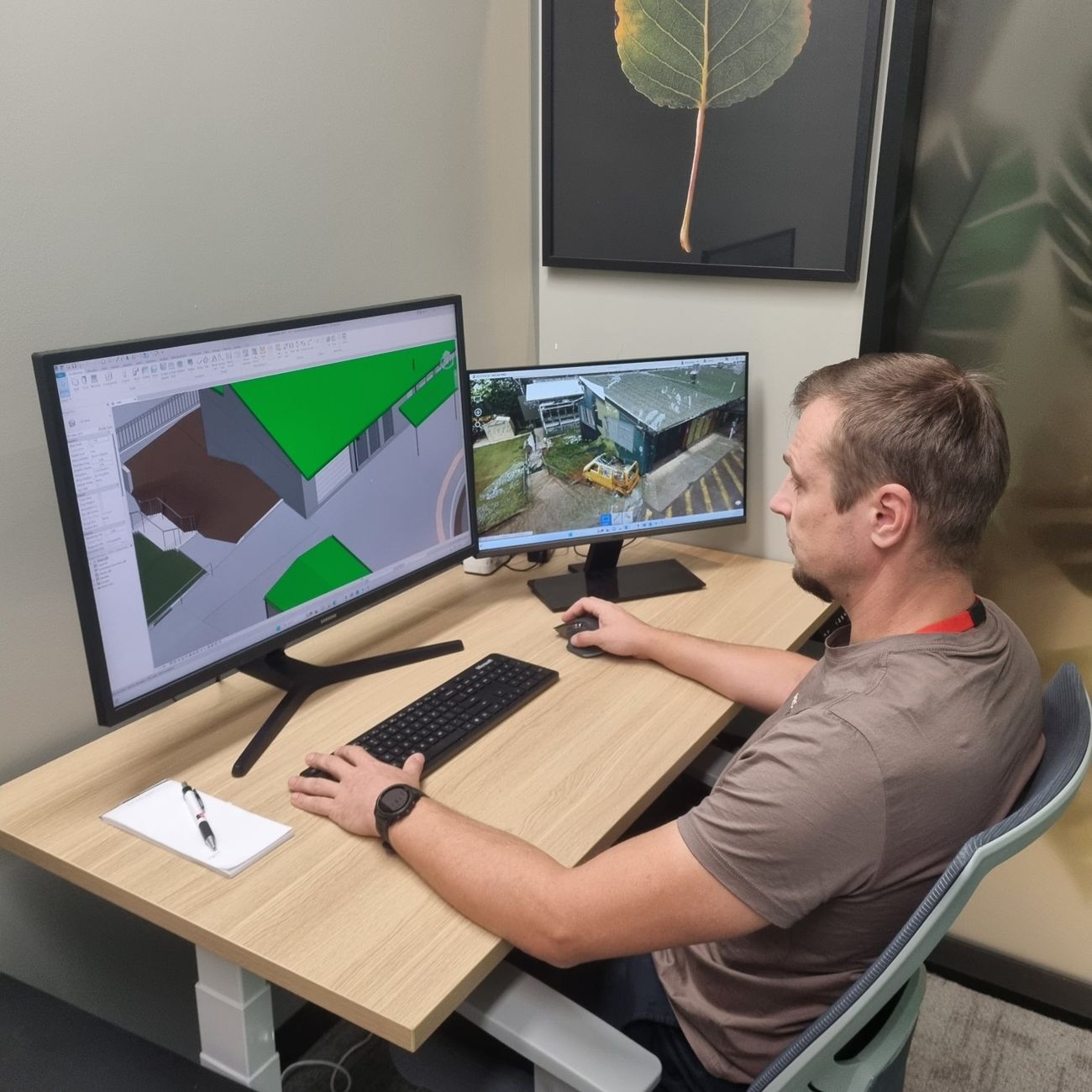 Surveyor reviewing site information at the desk
